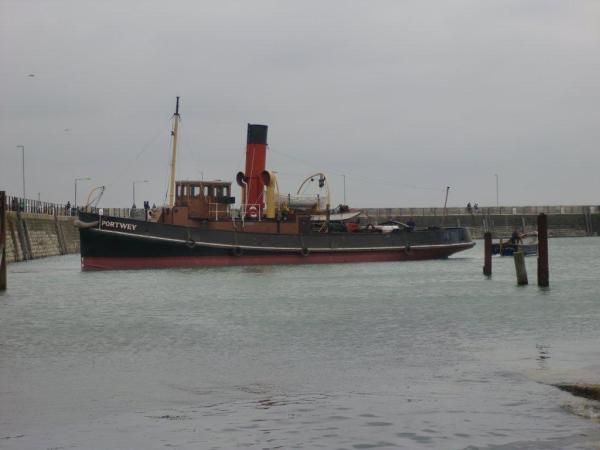 Portwey - afloat and being towed to the Eastern Wall