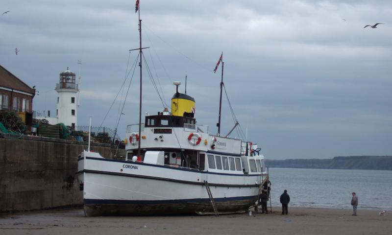 Coronia - beached in Scarborough, being painted 2008