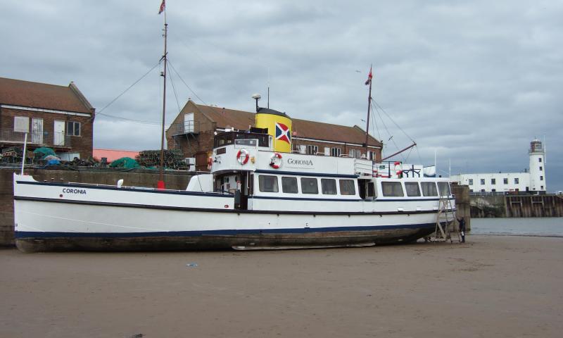 Coronia - beached in Scarborough, being painted 2008