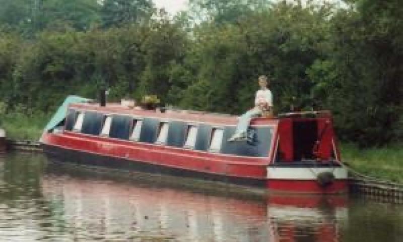 Andromeda No 5 moored in a canal