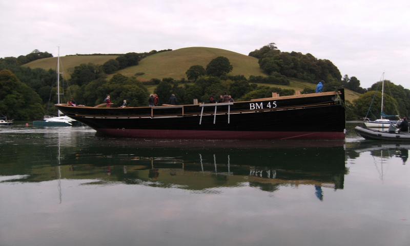 Pilgrim - relaunched on 30 Aug 2011 leaving dry dock and towed to a mooring at the mouth of Old Mill Creek on the river Dart (above Dartmouth).