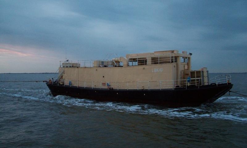 LBK6 on tow, stern quarter, starboard side