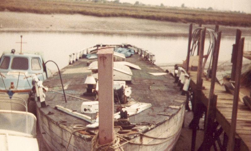 Comus of Wivenhoe without her rig, waiting for restoration