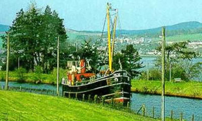 Postcard of Crinan Canal with VIC 32 at Ardishaig looking towards Lochgilphead