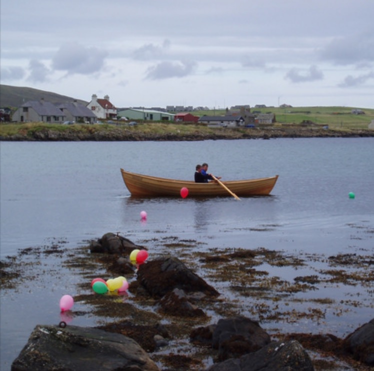 Georgie McDonald rowing boat at sea