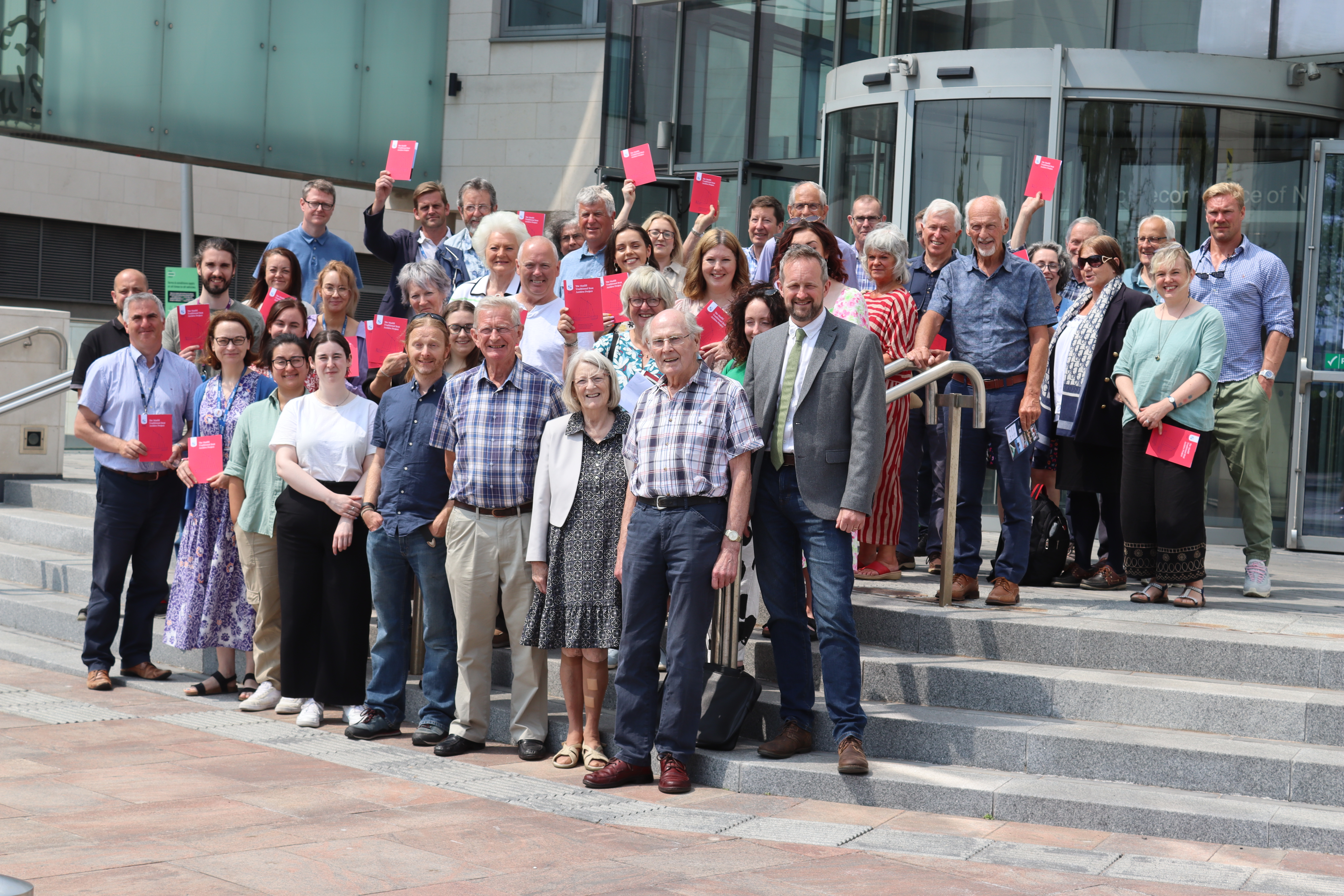 Attendees of the Madill Project launch event standing on the steps leading into the building of the Public Record Office of Northern Ireland