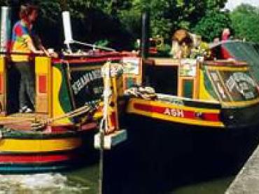 COLINGWOOD (left) and ASH (right) -  stern from starboard quarter looking forward.