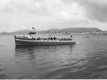 NEPTUNE under way - port side view.
