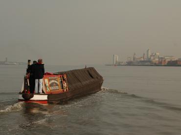 Swallow crossing the Mersey from Eastham to Liverpool to attend the Spring on the Waterfront festival - Photo Comp 2011 entry