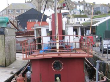 Feasible's stern looking forwards - moored at Penzance