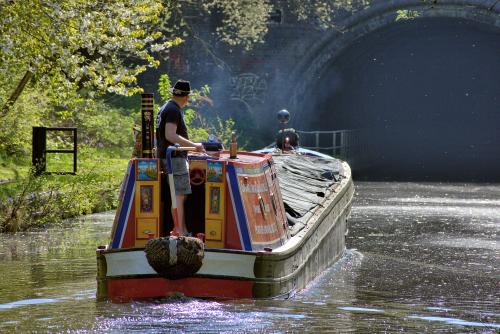 Small Woolwich narrow boat Corolla heading for Netherton Tunnel, Birmingham Canal Navigations.