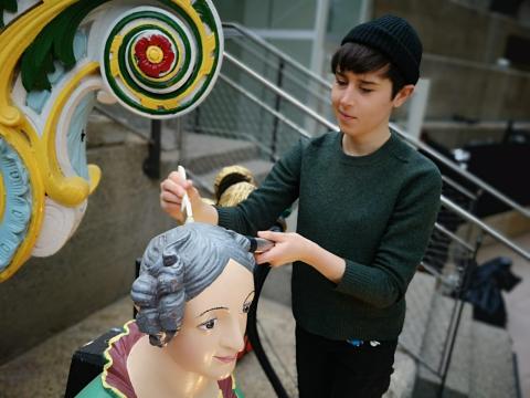 Kate working on ships figurehead