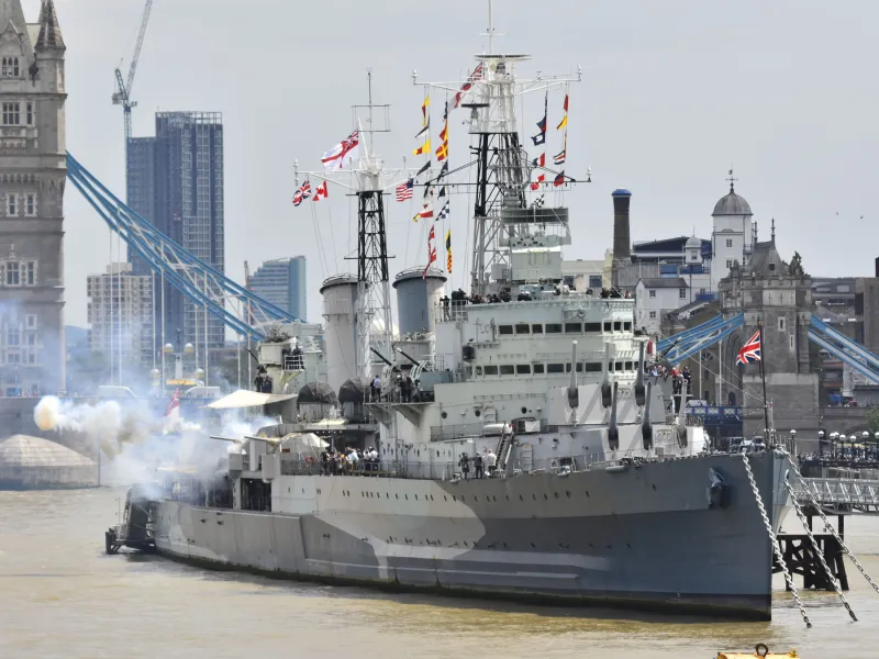 HMS Belfast firing her guns for Anniversary of D-Day by Jason Arthur