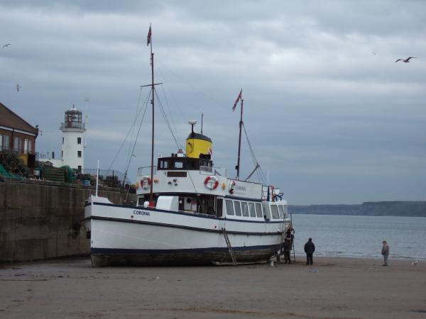 Coronia - beached in Scarborough, being painted 2008