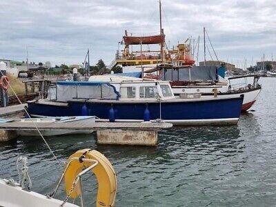 Terrier afloat in Lowestoft Harbour, January 2023