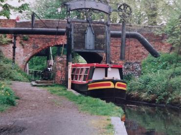 Anson going through a canal lock