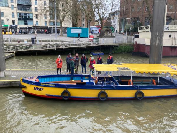 Independence moored alongside a pontoon