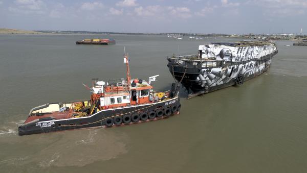 HMS President being towed to Erith, July 2026