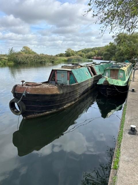 Banbury moored on river