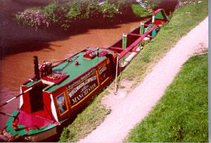 STARLING - stern from starboard quarter looking forward showing open cargo holds.