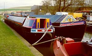 ST AUSTELL (butty on left) and motor baot CHISWICK on right - at Langley Mill near Nottingham. Bow looking aft.