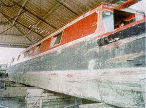 DOVE - in dry dock on Shropshire Union. Port side loking forward.