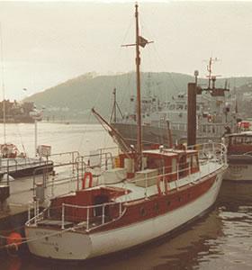 KINGFISHER - alongside quay. Stern from starboard quarter looking forward.
