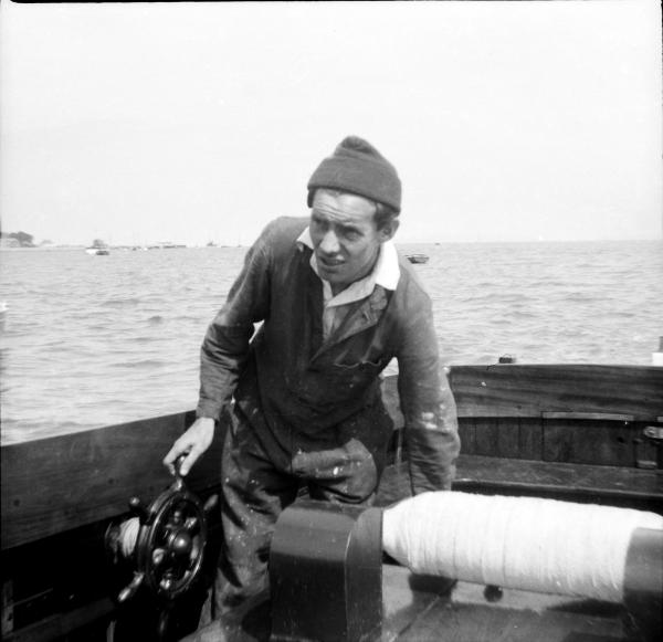 Kami-No-Michi: boatman Peter Brimecombe who looked after vessel at the curious fore-and-aft wheel of Kami's tender 'Stardust'
