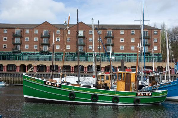 Sovereign - in St Peters Marina, having undergone extensive restoration.  Port side view.