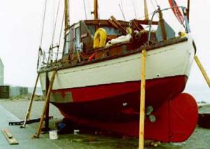 ROS BHAN - hauled out for repainting. Stern from port quarter looking forward.