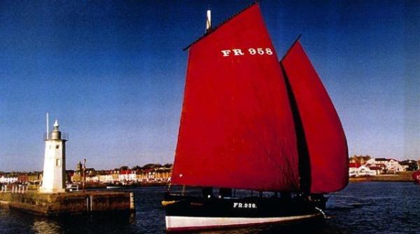 Reaper under sail - port side view