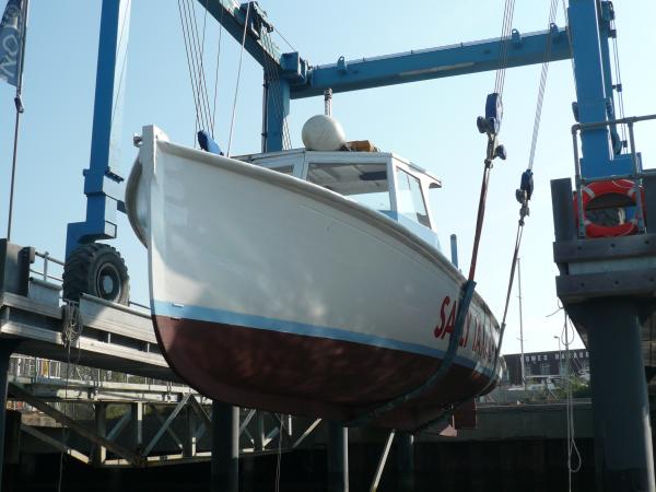 Nomad being lifted into the water