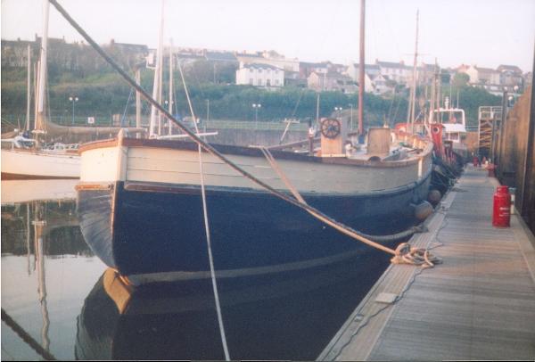 MFV 74 alongside - stern view