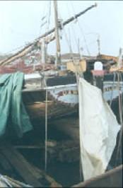 Dawn - under cover and being replanked at Hoo Marina. Ref: 96/3/4/8