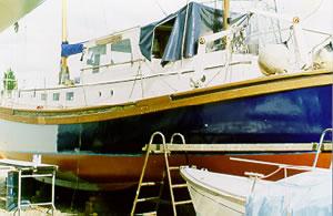TRIMILIA - hauled out for repainting. Port side looking forward.