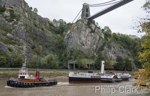 Medway Queen - with tug 'Christine' beginning her journey down the river Avon to the Medway
