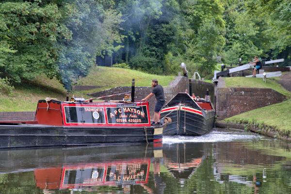 Narrow boats Tadworth and Bordesley leaving the bottom lock of the Stourton flight to join the Staffordshire & Worcestershire Canal