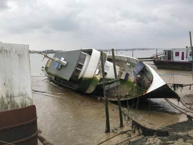 Llys-Helig capsized on moorings April 2018 pending refloat and restoration