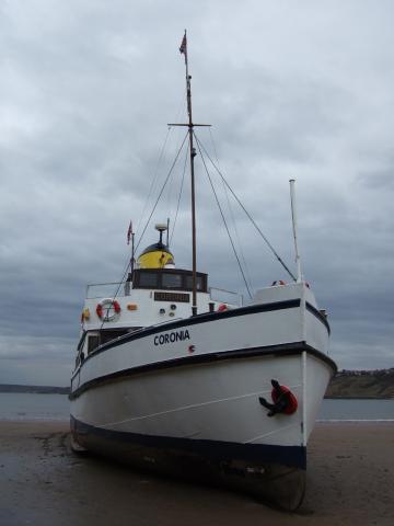 Coronia - beached in Scarborough, being painted 2008