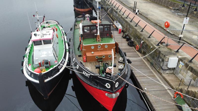 two historic tugs together