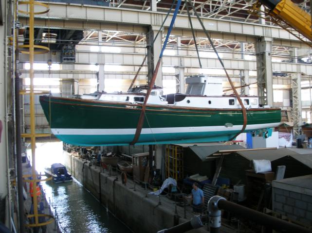 Green Parrot being lifted back into the water after refit 2006