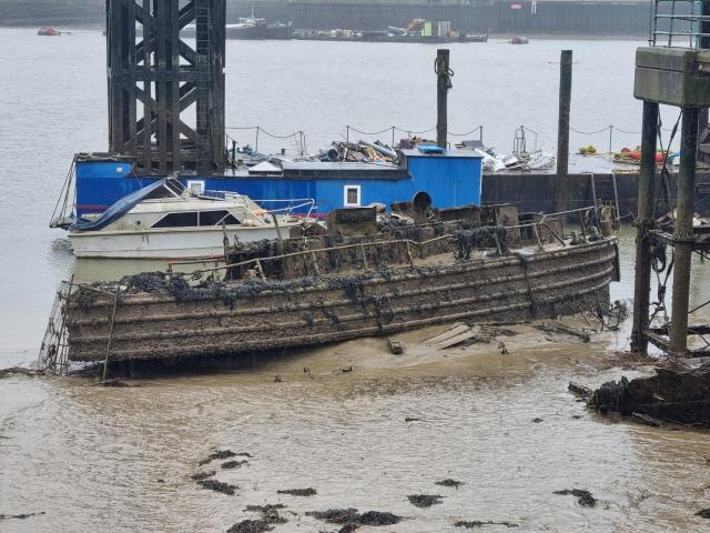 Water Haigh part-sunk at Strood March 2023