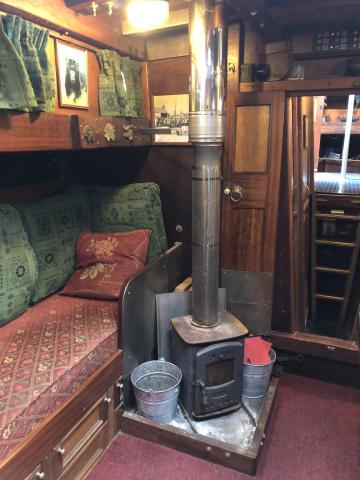 Solid wood burning stove in main saloon