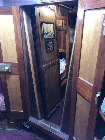 Image showing unusual wedge shaped doors from saloon to forward passage way