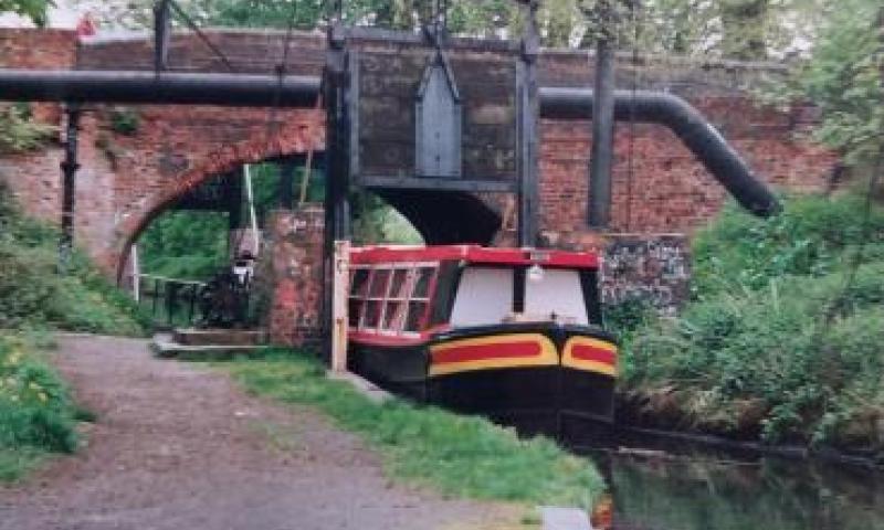 Anson going through a canal lock