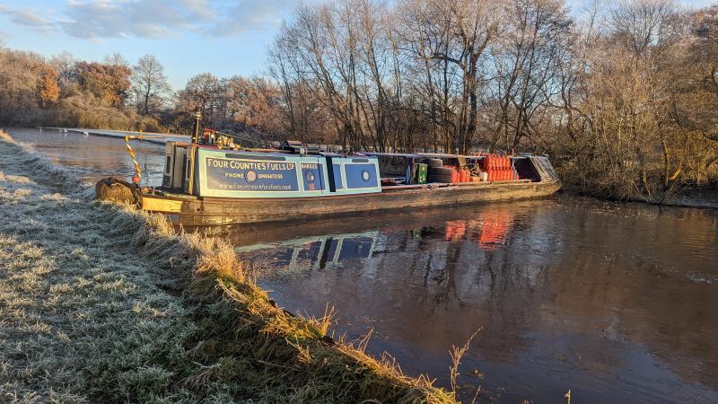 Bargus across the width of a canal