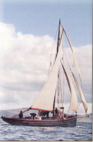 ALPHA - off west coast of Skye, 1996. Starboard side amidships, under sail.