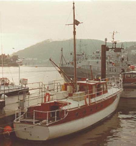 KINGFISHER - alongside quay. Stern from starboard quarter looking forward.