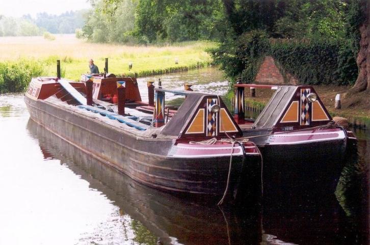 Cedar alongside another vessel