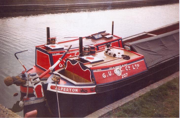 ALPERTON (foreground) - with motor DARLEY. Stern cabin and tiller  from starboard side.